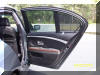 Right rear door view, one blind down