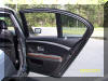 Right rear door view, both blinds and one window down