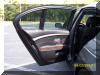 Left rear door view, both blinds down