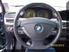 View of the instrument cluster and steering wheel
