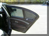 Back seat, right door, one blind down