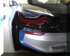 i8, close up of left rear lens assembly