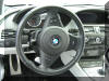 Steering wheel and paddles